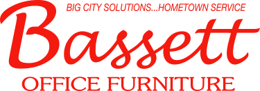 A red and white logo for bassett office furniture