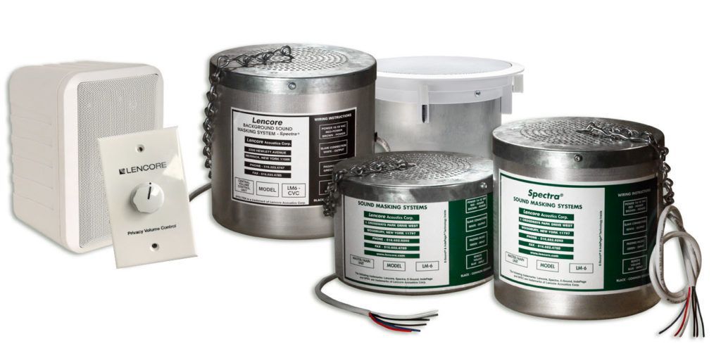 A group of cylinders with green and white labels on them