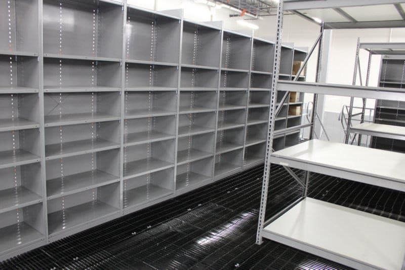 A room filled with lots of shelves and shelving