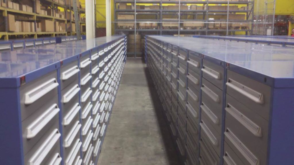 A warehouse filled with lots of drawers and shelves