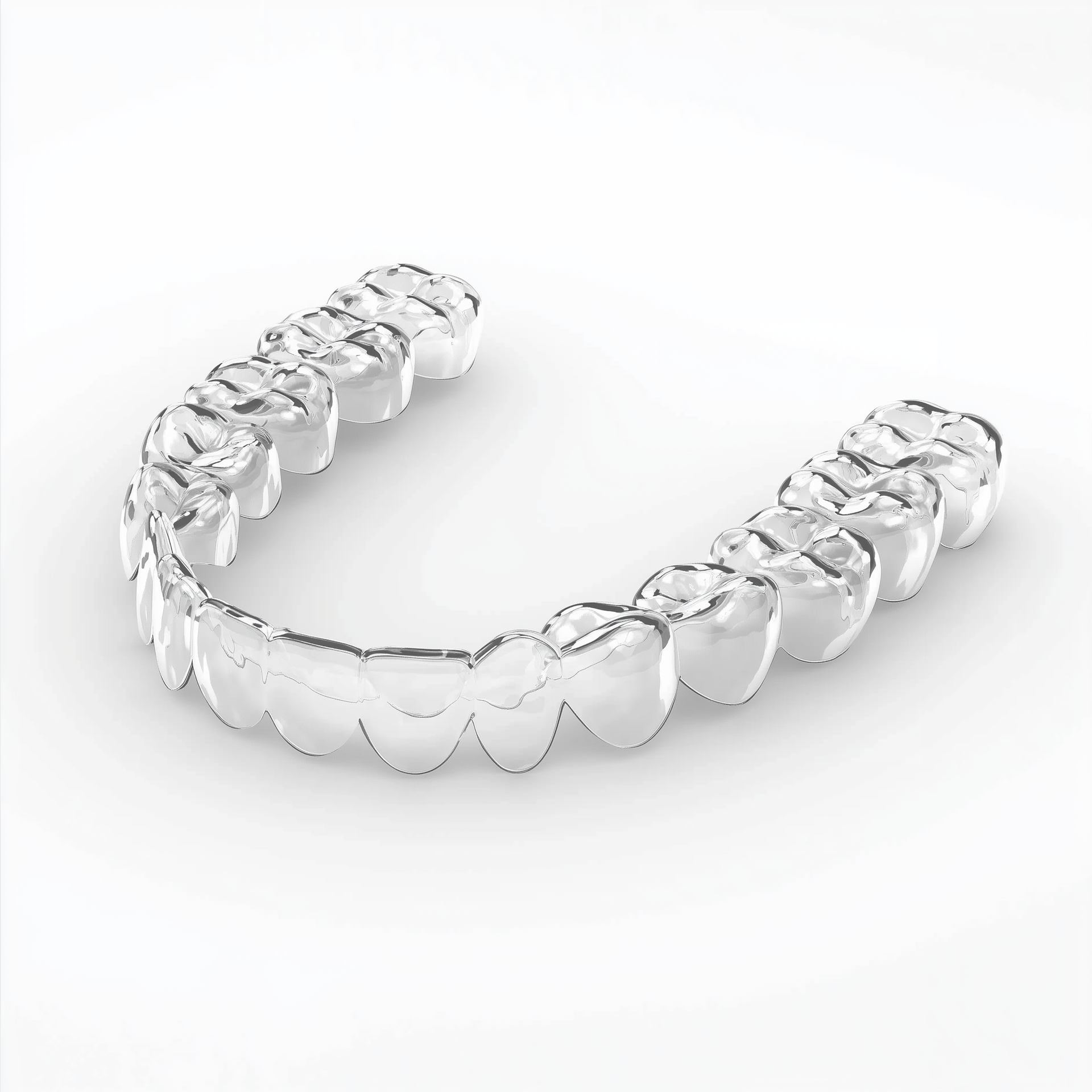 A clear, plastic dental aligner tray shown against a white background.