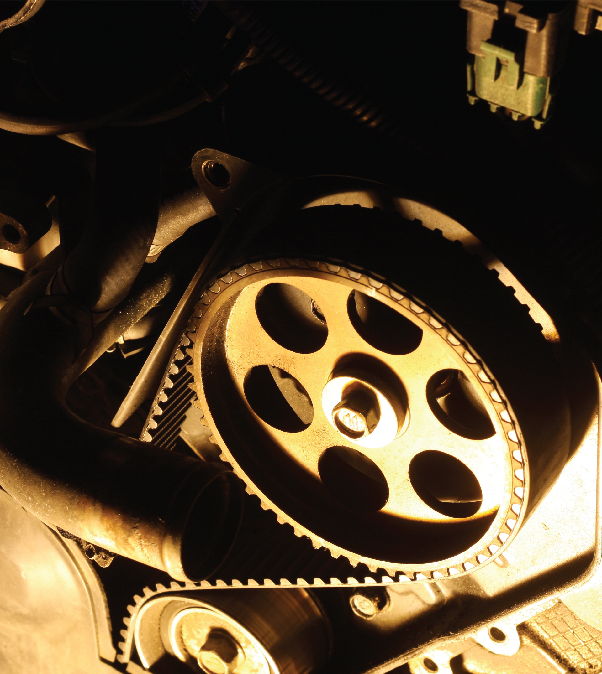 A close up of a gear in a dark room