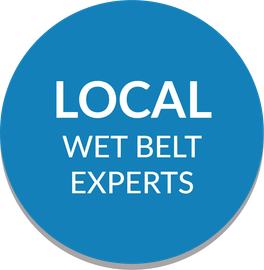 A blue circle with the words local wet belt experts on it
