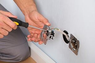 Repairing a plug - Electric Contractors in Chambersburg, PA