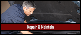 Mechanic Working under Hood - Automotive Repair Shop