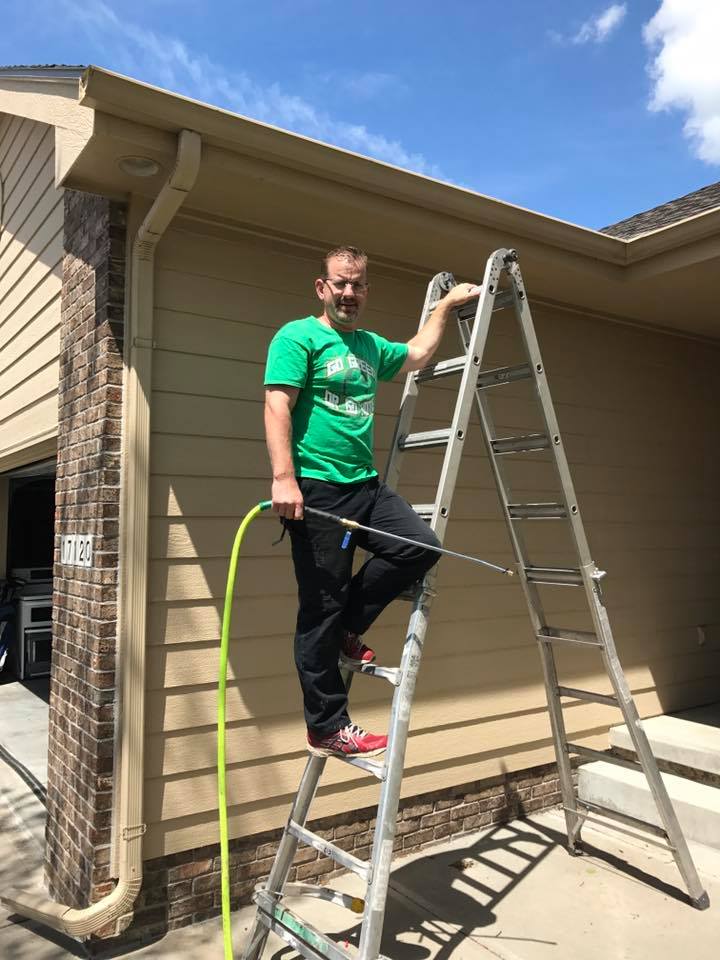Man on Ladder  – Omaha, NE – Loberg & Sons Gutter Cleaning