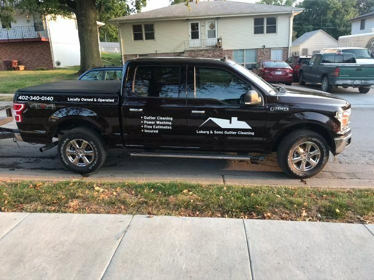 Black Service Car – Omaha, NE – Loberg & Sons Gutter Cleaning