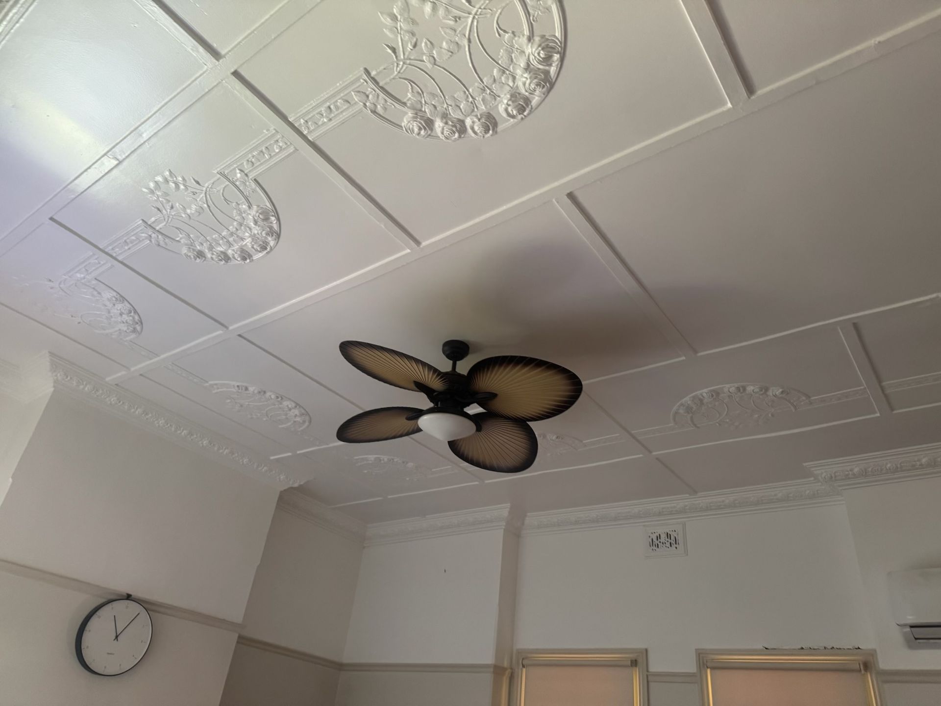 Ceiling With Decorative Panels, and Wall Clock Above Doorway — Robert Seeliger Painter And Decorator in Dubbo, NSW