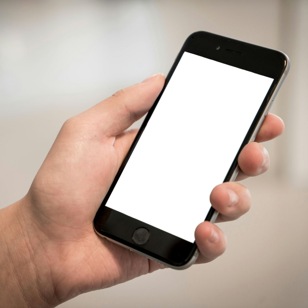 Hand holding a mobile phone
