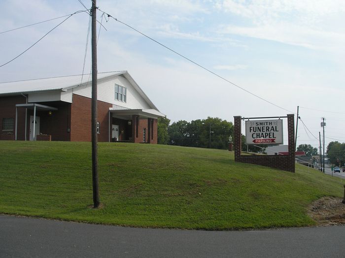 a funeral chapel is located on the side of the road