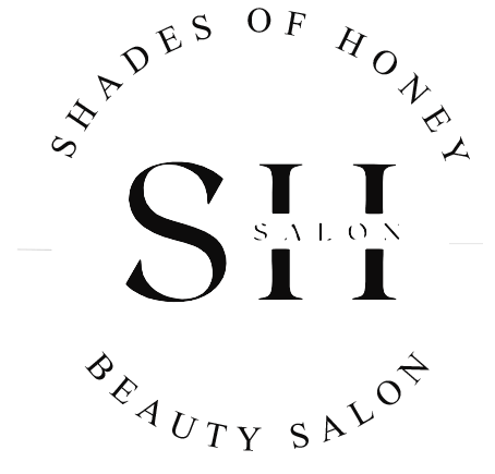 The logo for shades of honey beauty salon is black and white.