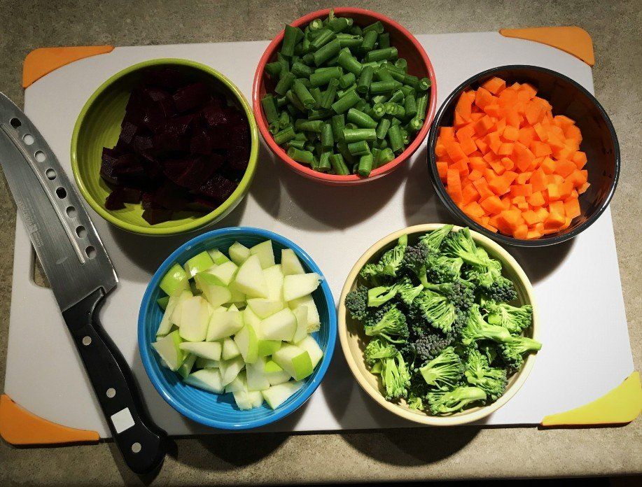 chopped salad ingredients in bowls