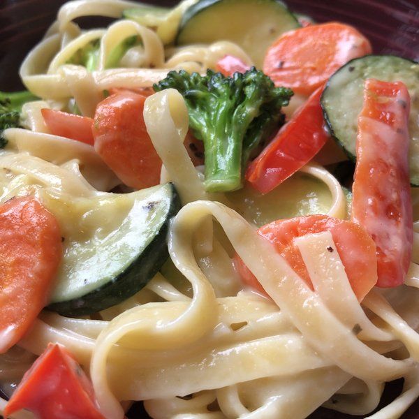 vegan pasta Alfredo primavera close up