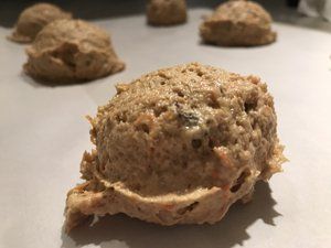 cookie dough scoop on baking sheet