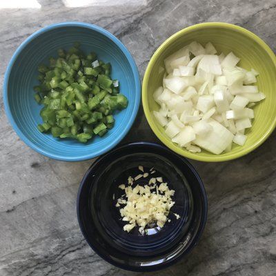 diced, onions and garlic in bowls