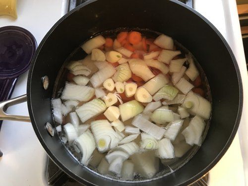 Broccoli and Vegan Cheddar Soup ingredients in pot