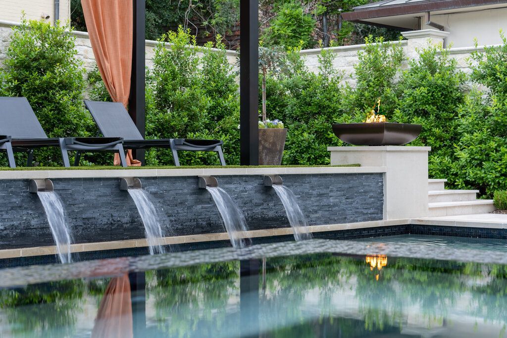 tiled custom pool with waterfall feature