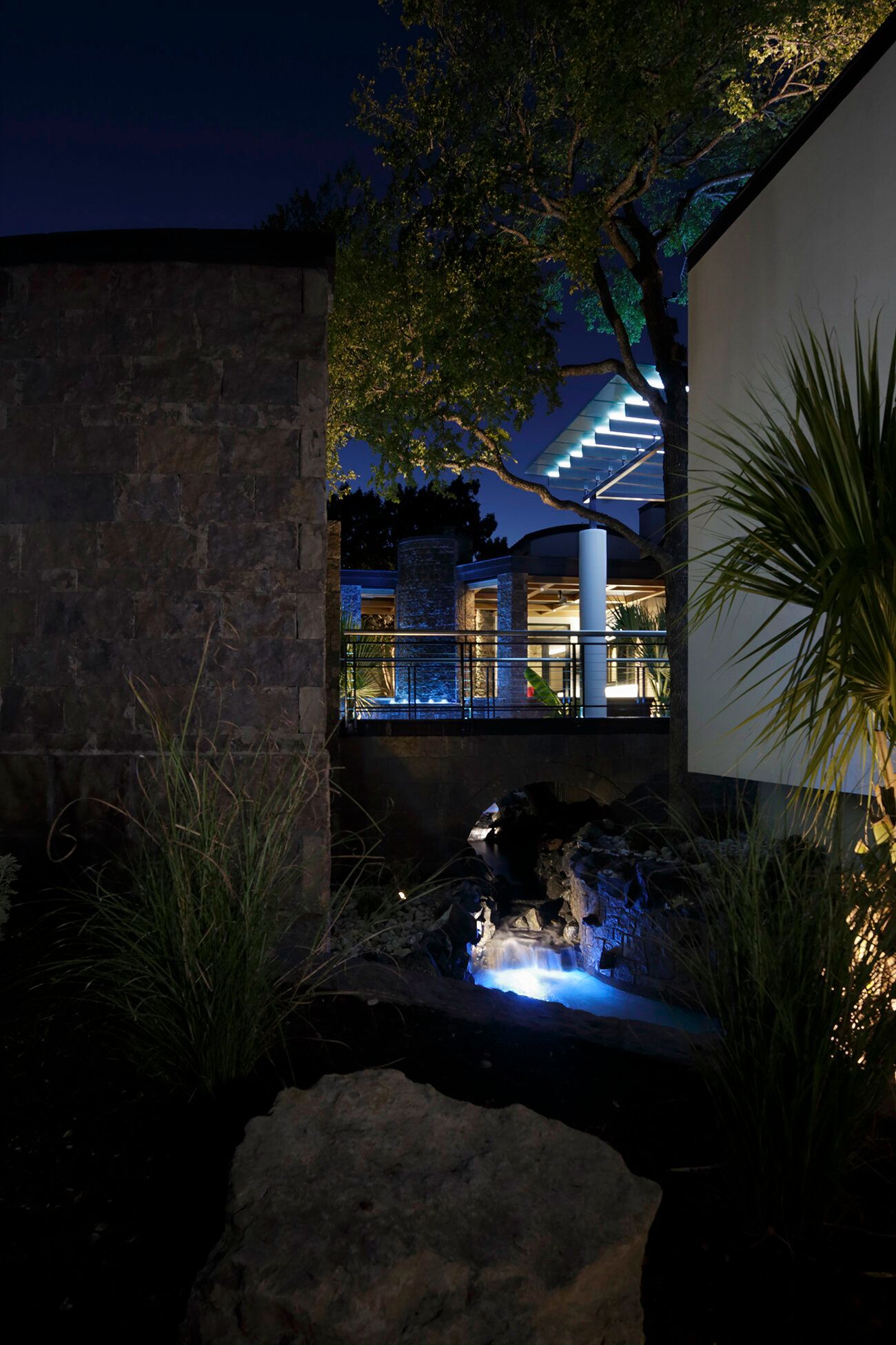 Fort Worth modern pool with fountain at night