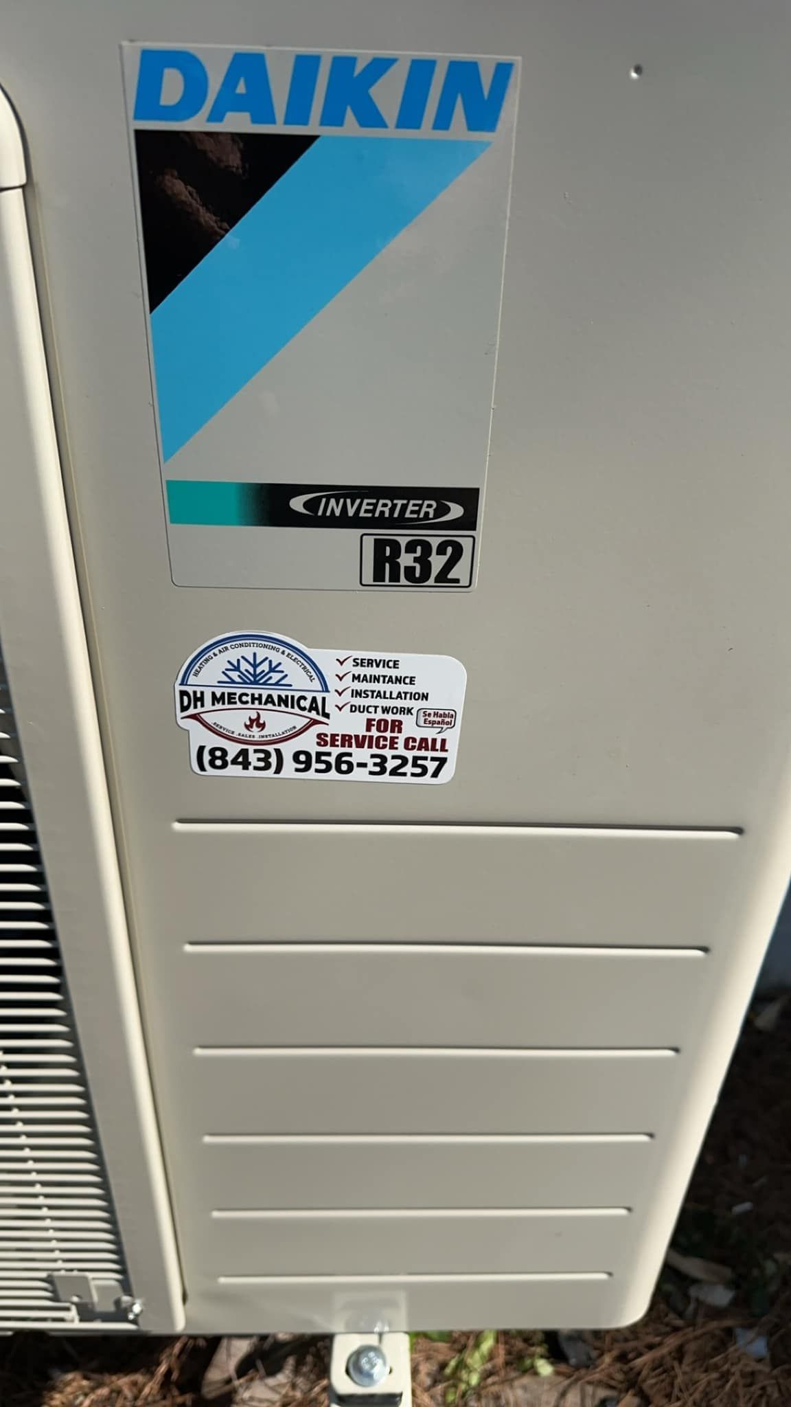 A daikin air conditioner with a sticker on it