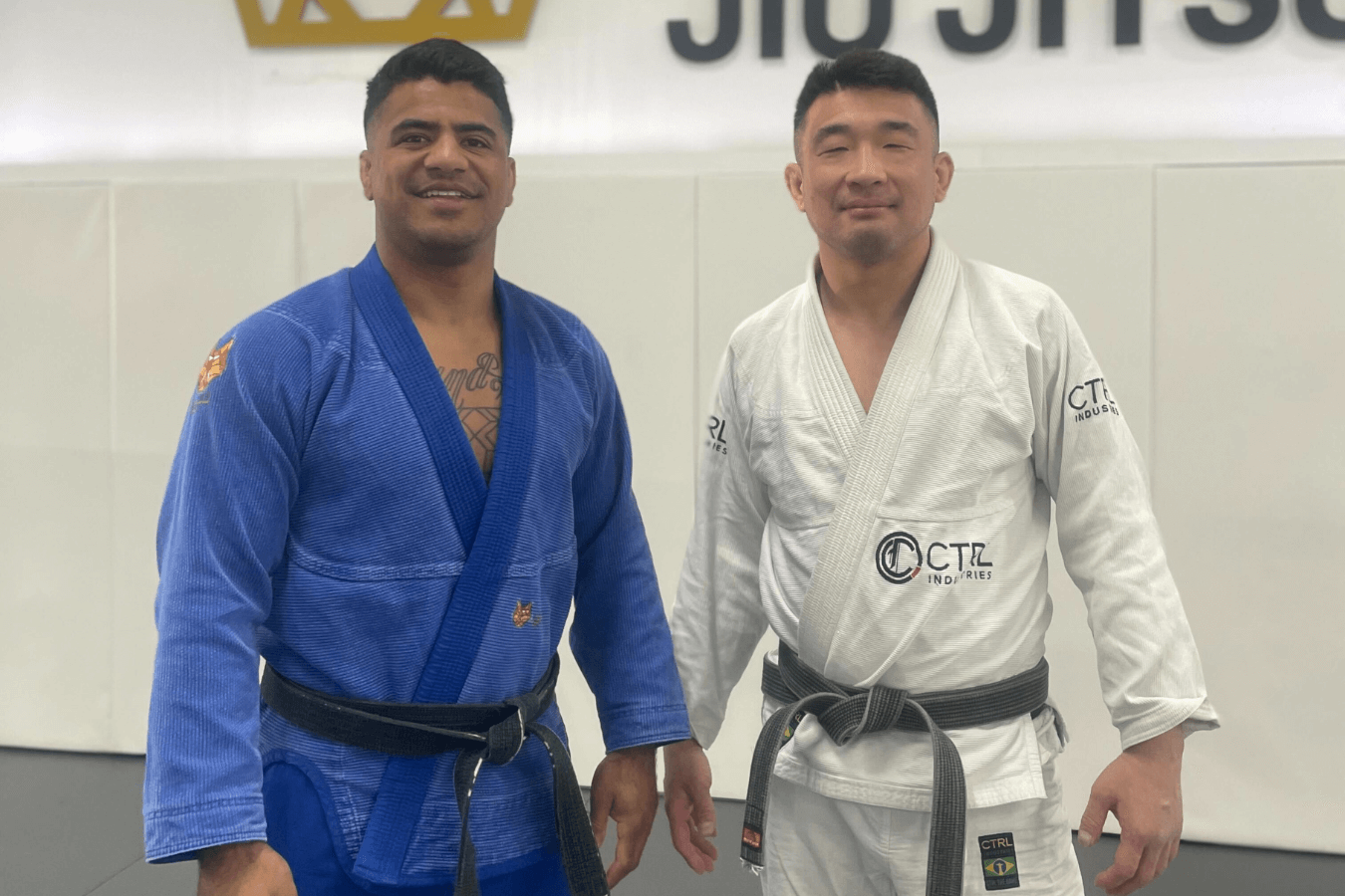 Partners drill brazilian jiu jitsu guard passing at Royal Jiu-Jitsu Queens in Queens, NY.