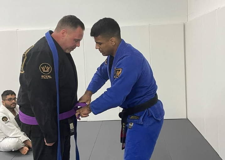 Adults drilling Brazilian Jiu-Jitsu techniques at Royal Jiu-Jitsu Queens in Queens, NY for confidence and stress relief.
