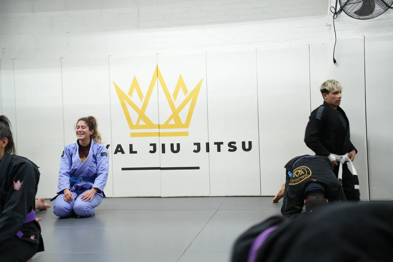 Beginners practicing positional control at Royal Jiu-Jitsu Queens in Queens, NY, building confidence