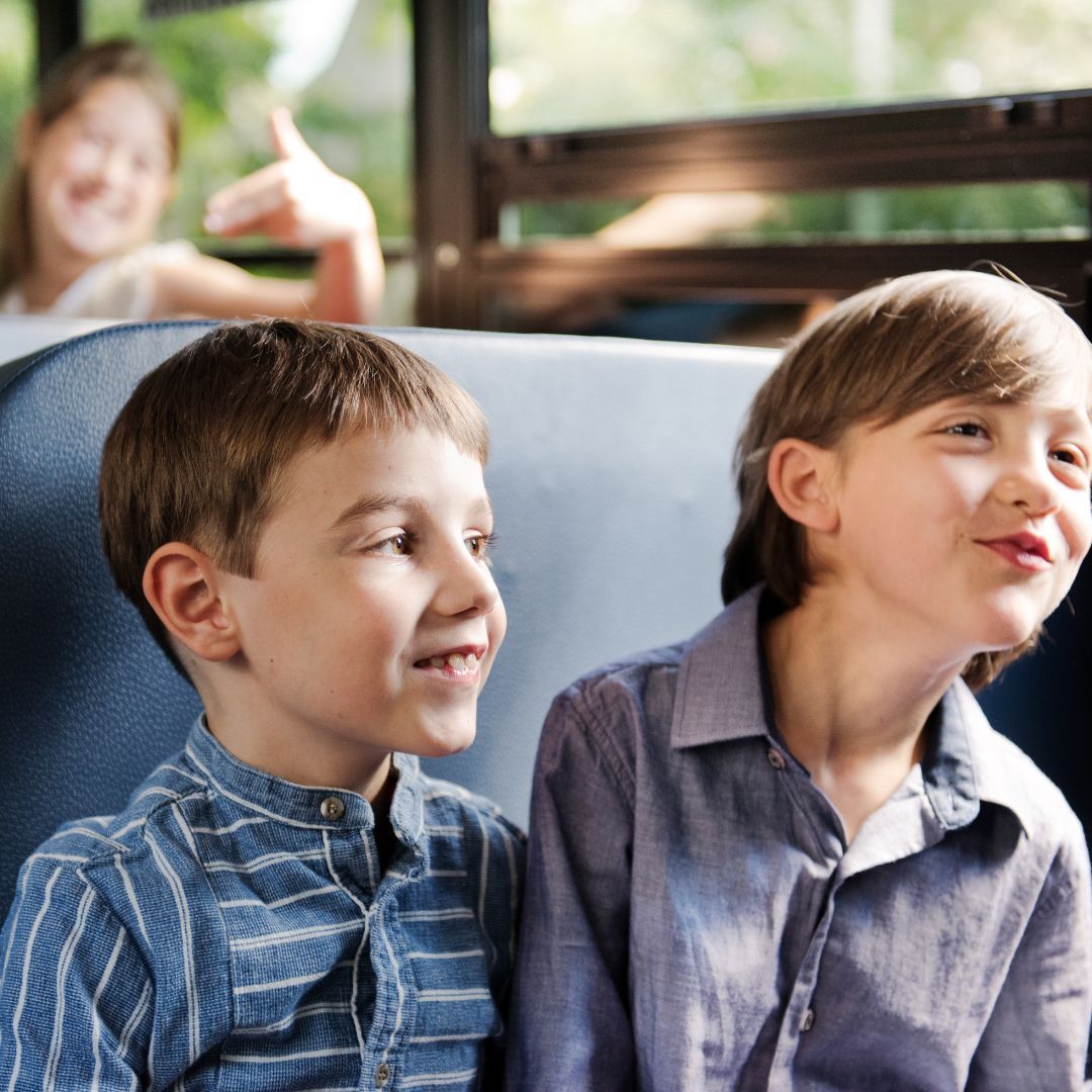 Children on charter bus