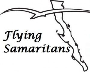 Logo for Flying Samaritans: Text and silhouette of a coastline, with an arc design.