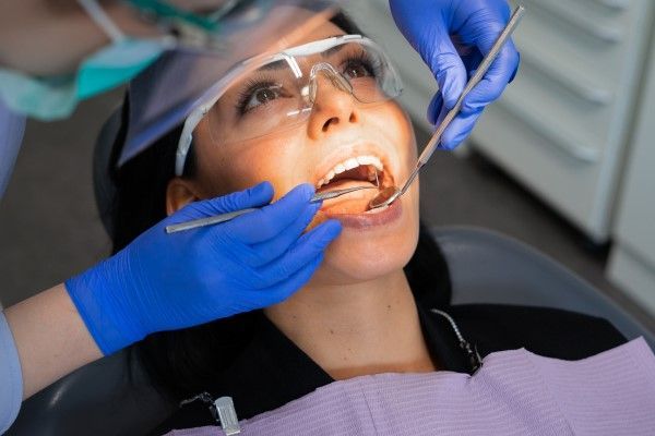Women getting dental work done