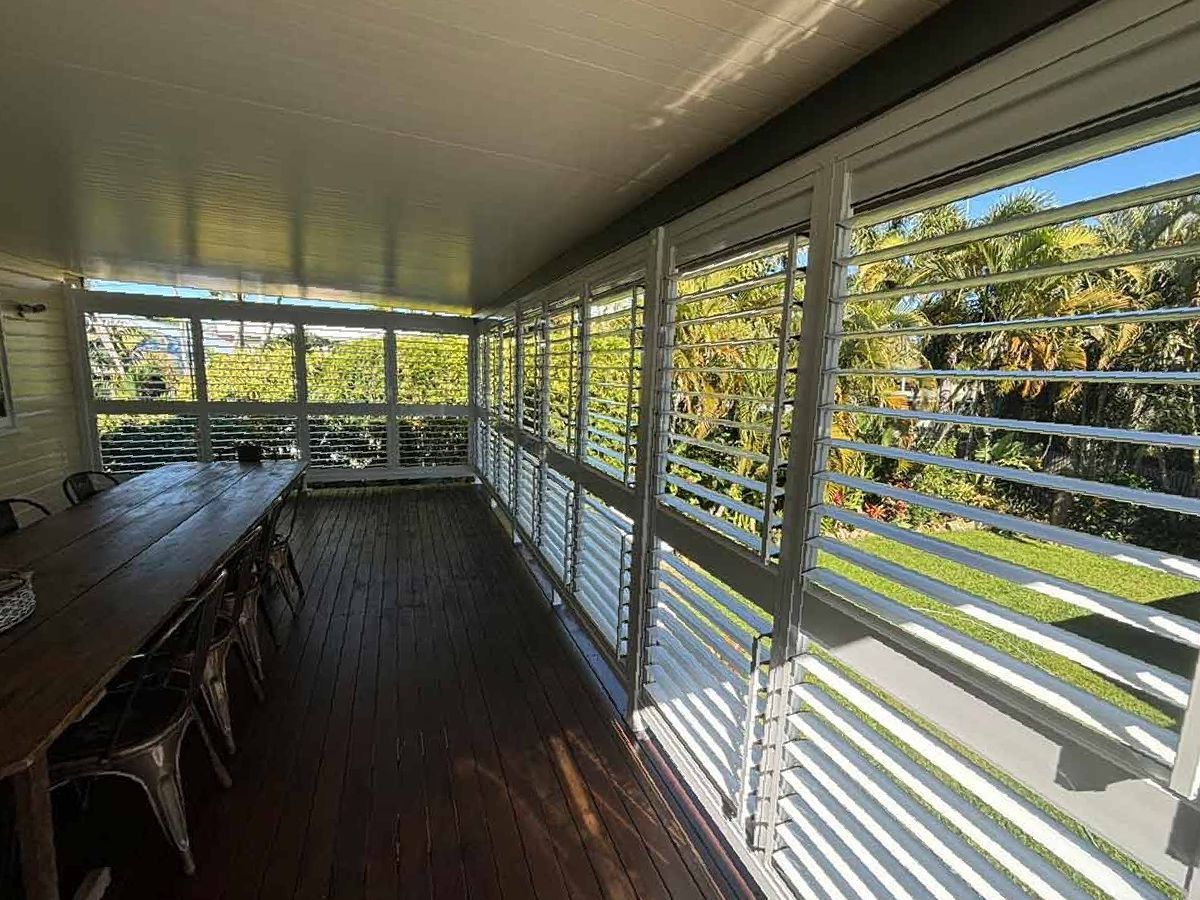 A Large Room With a Table and Chairs and Lots of Windows — Cover Me NQ in Currajong, QLD