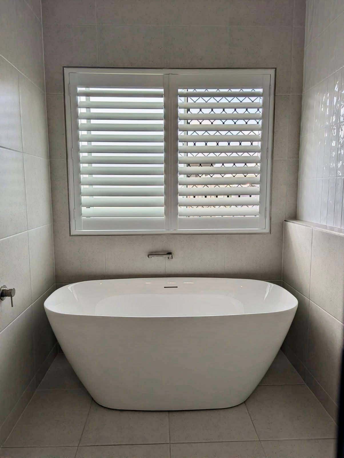 A Kitchen With a Table and Chairs and Shutters on the Windows — Cover Me NQ in Currajong, QLD