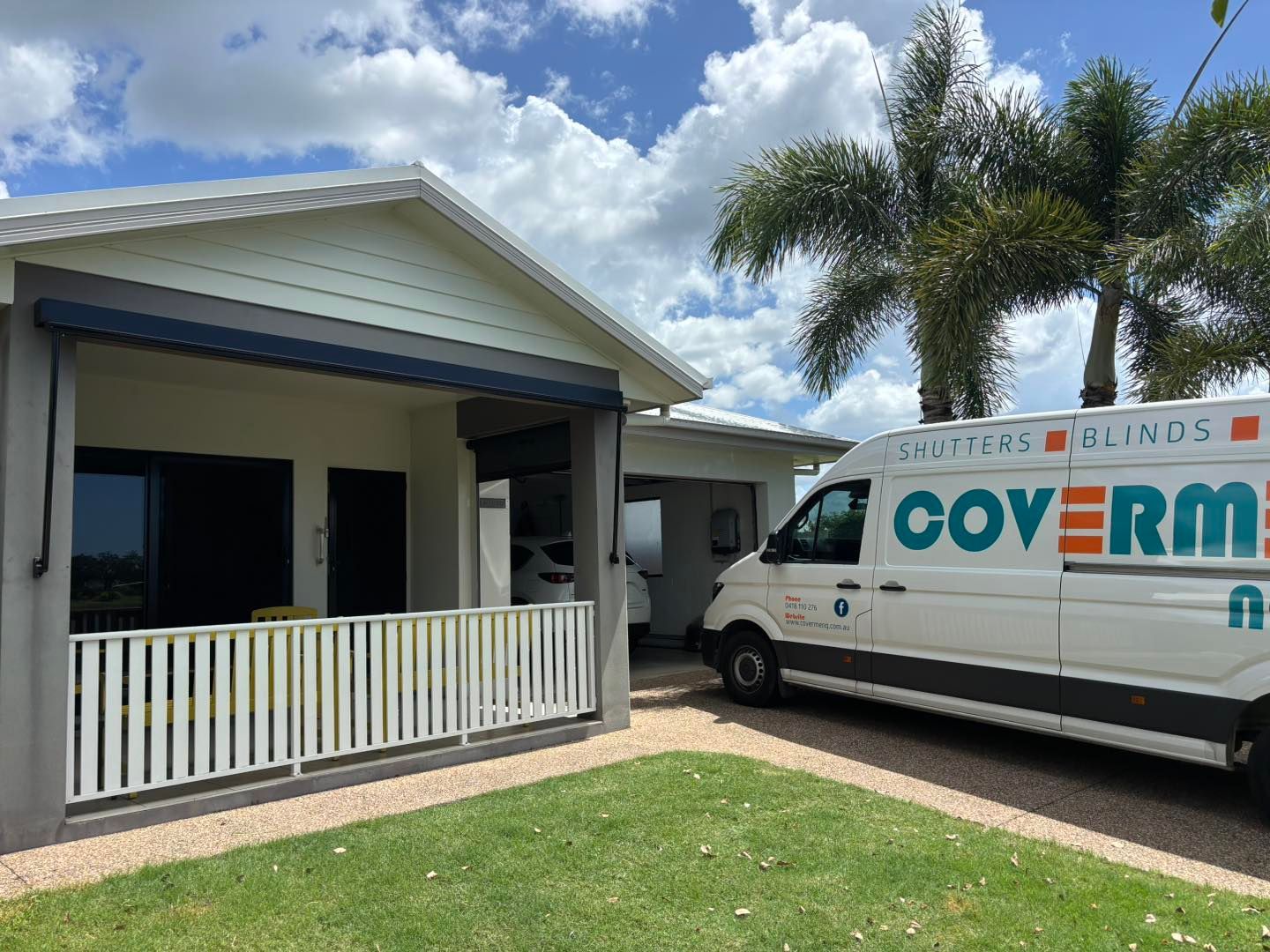 A Dining Room With a Wooden Table and Chairs and a Vase of Flowers on the Table — Cover Me NQ in Currajong, QLD