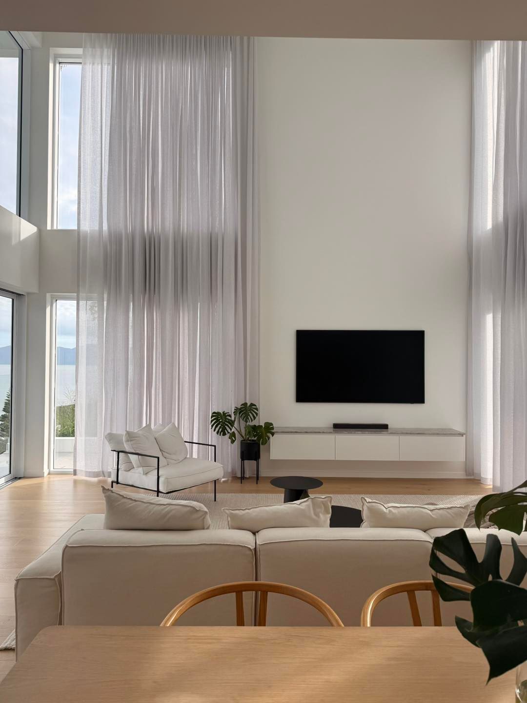 A Bedroom With a Bed, Dresser, Shelves and a Window — Cover Me NQ in Currajong, QLD