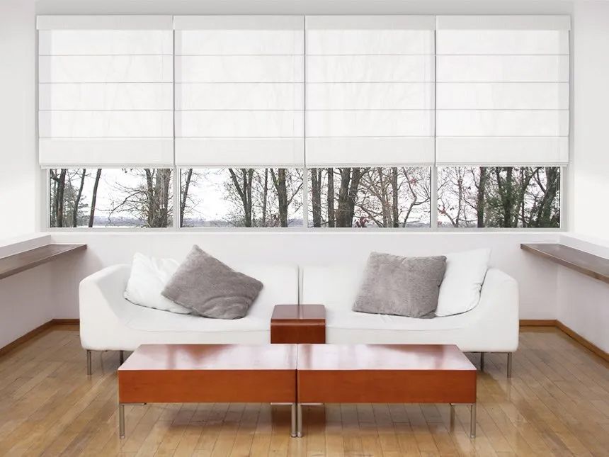 A Living Room With a White Couch and a Wooden Table — Cover Me NQ in Currajong, QLD