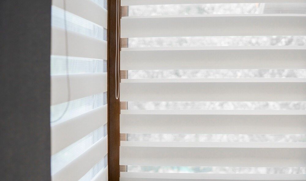 A Close Up of a Window With White Blinds on It — Cover Me NQ in Currajong, QLD