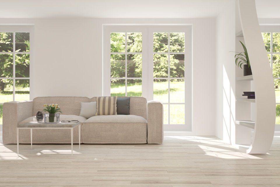 living room with large doors and windows