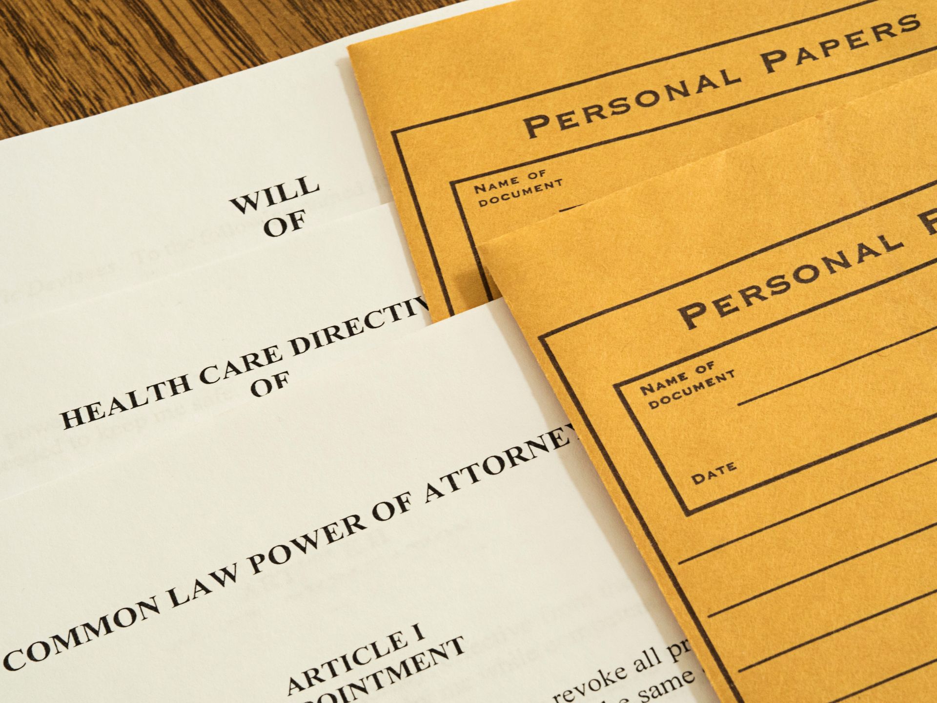 Power of Attorney and Health Care Directive documents lay on a table.
