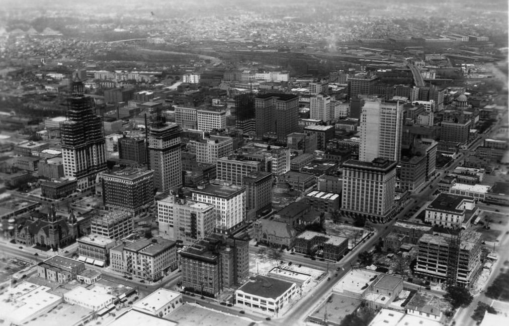 An aerial view of a city with lots of buildings