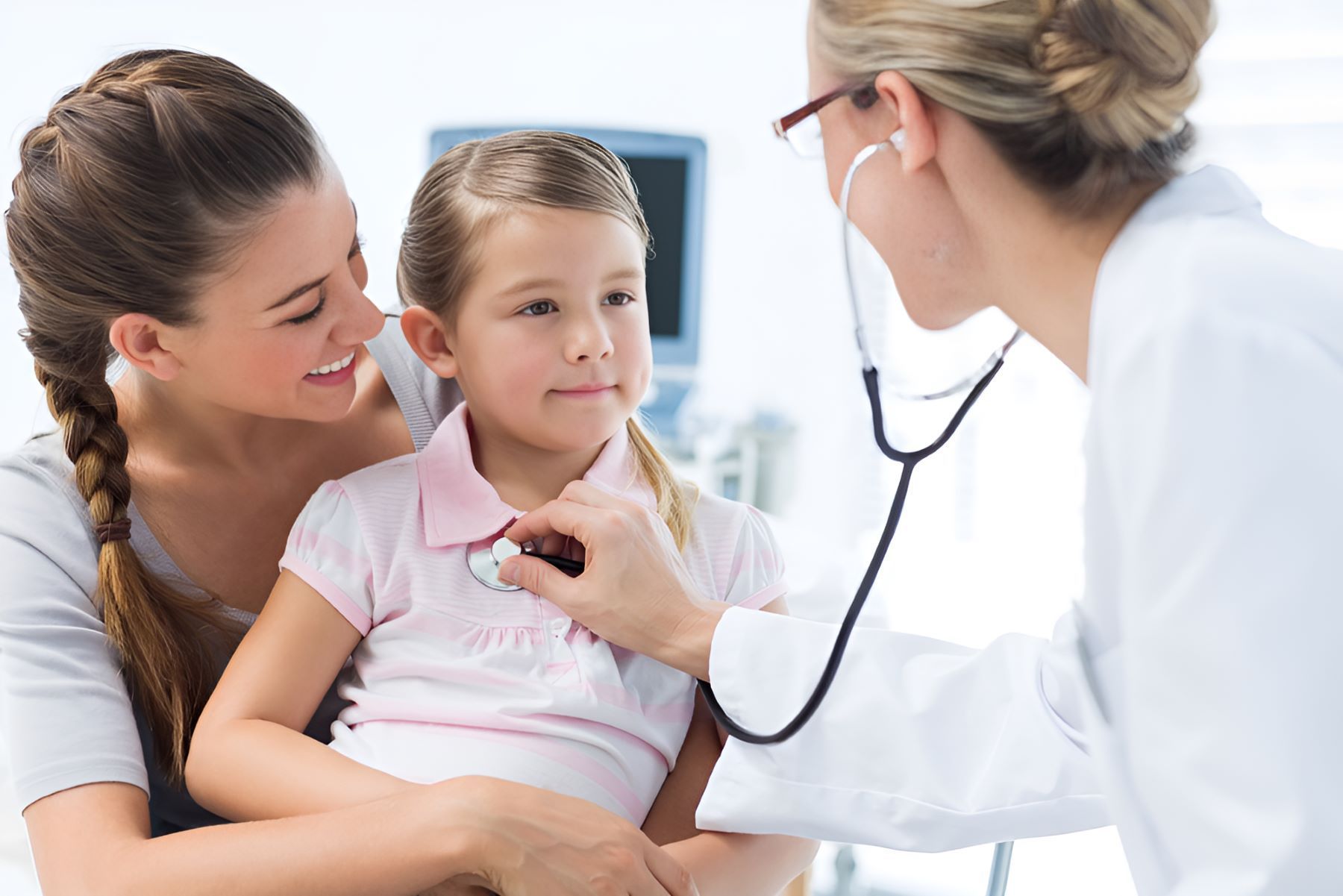 A Doctor is Listening to a Little Girl 's Heartbeat — Newcastle Paediatric Occupational Therapy In Floraville, NSW