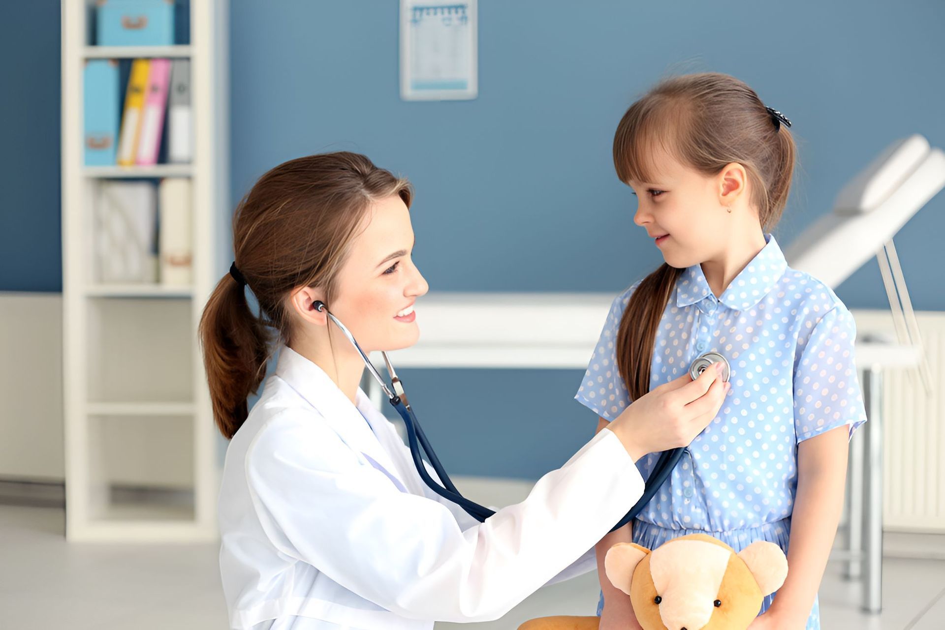 A Doctor is Listening to a Little Girl 's Heart— Newcastle Paediatric Occupational Therapy in Belmont, NSW