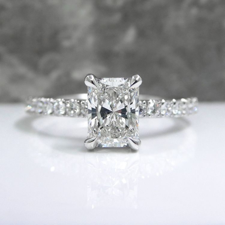 Kimberfire oval pave solitaire engagement ring