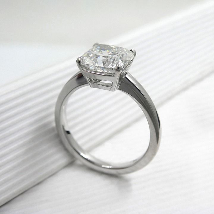 Kimberfire cushion solitaire engagement ring