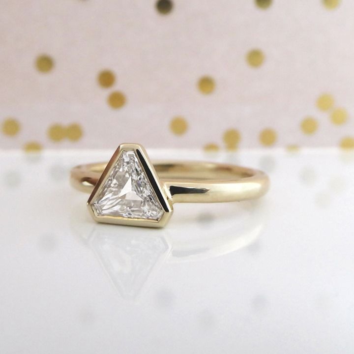 Kimberfire triangle bezel engagement ring