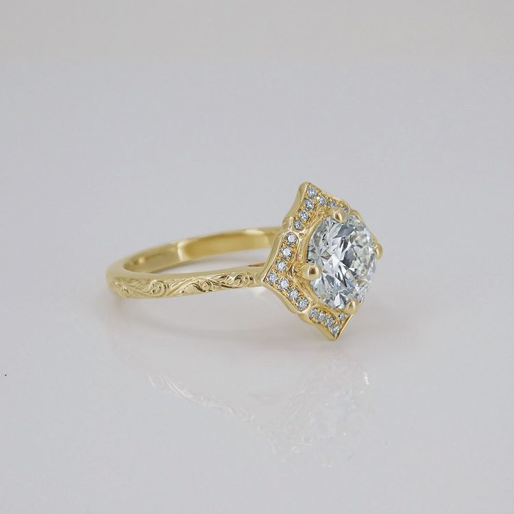 Kimberfire hand engraved engagement ring