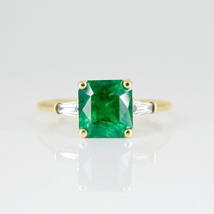 Kimberfire emerald gemstone engagement ring