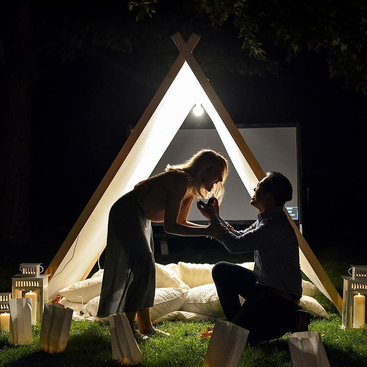 Kimberfire couple proposal in tent.