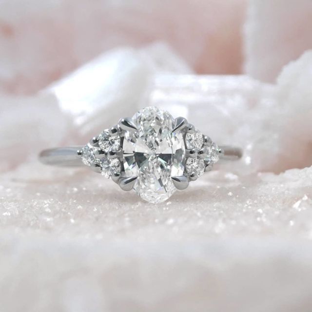 kimberfire oval and cluster engagement ring