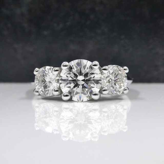 Kimberfire round three stone engagement ring
