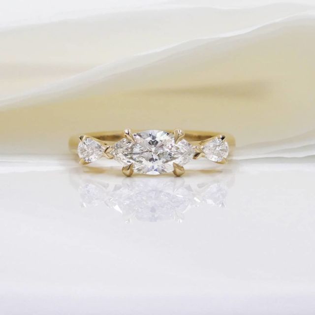 Kimberfire three stone marquise and pear engagement ring