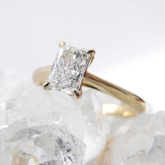Kimberfire radiant solitaire yellow gold engagement ring